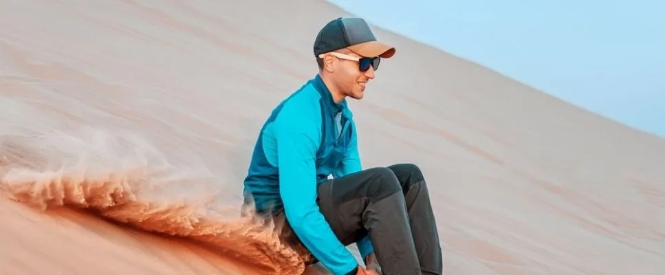 Sliding down the Singing Dunes of Qatar